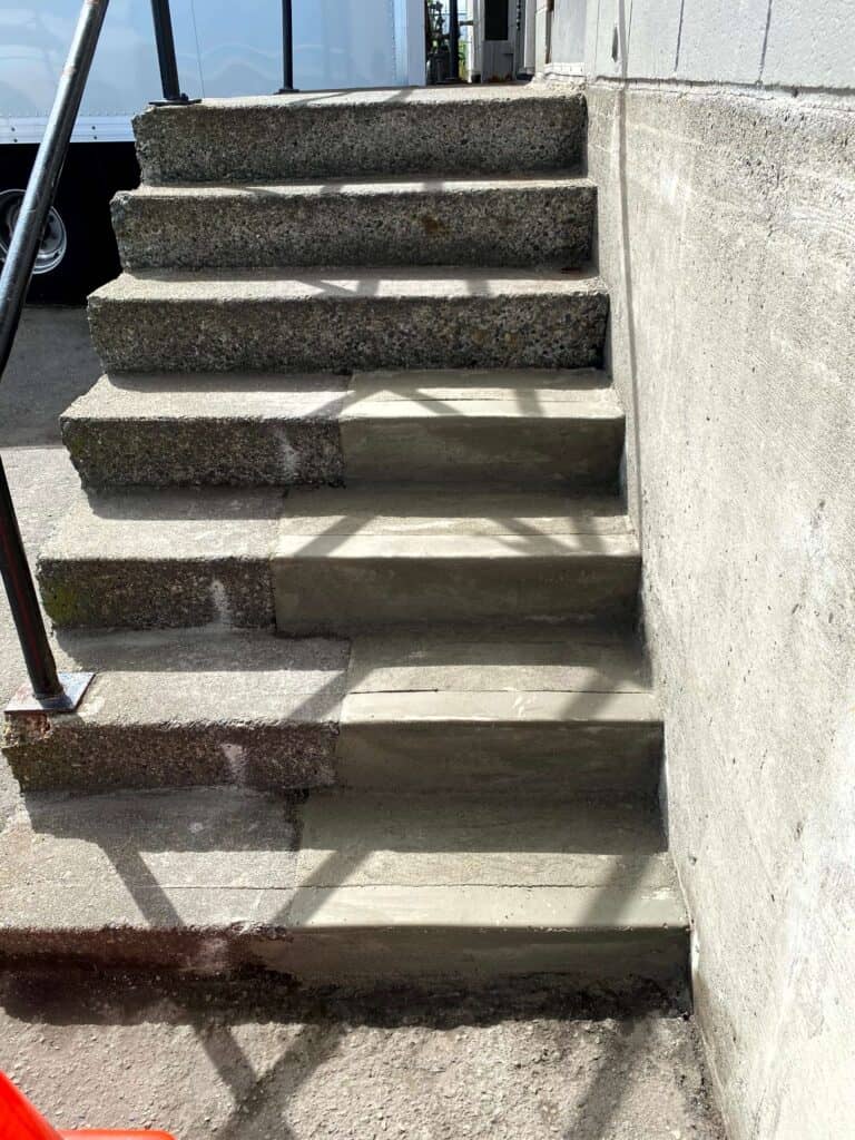 Concrete steps from recent repairs.